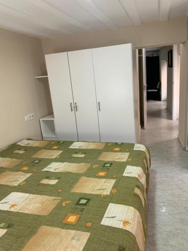 Posteľ alebo postele v izbe v ubytovaní Apartamento en Cádiz capital