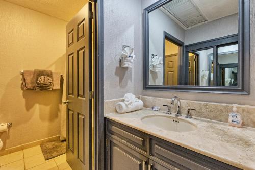 a bathroom with a sink and a mirror at Sonoran Sea 310-W - Modern 1 bedroom in Puerto Peñasco