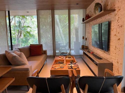 Et sittehjørne på Luxo Fazenda Marambaia Home