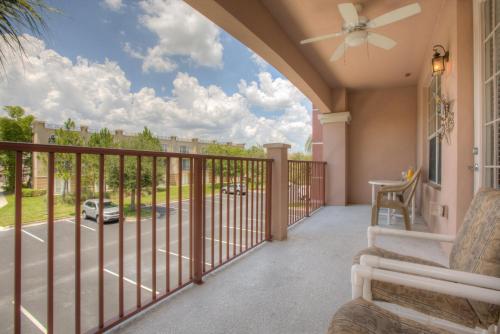 a balcony with a view of a street at Beautiful Condo at Vista Cay Resort Near WDW in Orlando