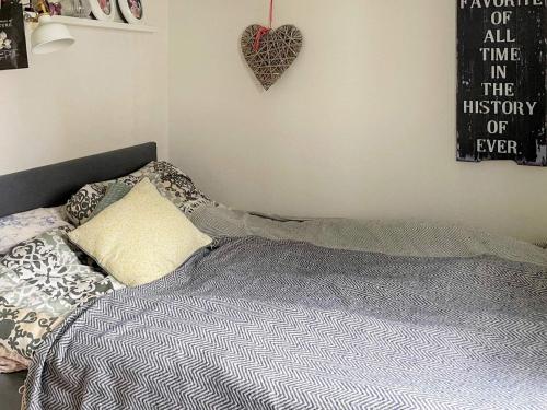 Кровать или кровати в номере Holiday home Spekeröd