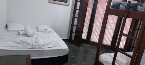 Katil atau katil-katil dalam bilik di Associação Sabesp Bertioga - SP