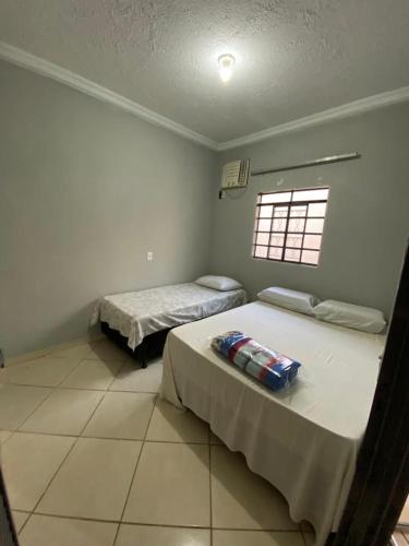 Ένα ή περισσότερα κρεβάτια σε δωμάτιο στο Pousada São José