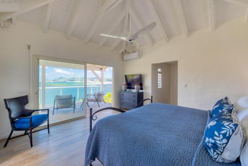 Ένα ή περισσότερα κρεβάτια σε δωμάτιο στο Villa Le Rocher