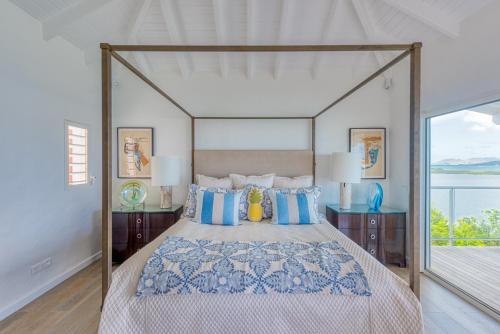 Ένα ή περισσότερα κρεβάτια σε δωμάτιο στο Villa Le Rocher