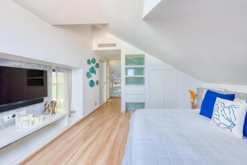 Ένα ή περισσότερα κρεβάτια σε δωμάτιο στο Villa Cest La Vie