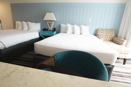 Ένα ή περισσότερα κρεβάτια σε δωμάτιο στο Hotel La Croix