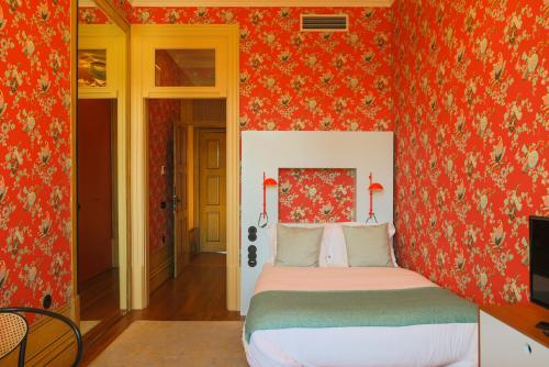 Letto o letti in una camera di Menina Colina Guesthouse