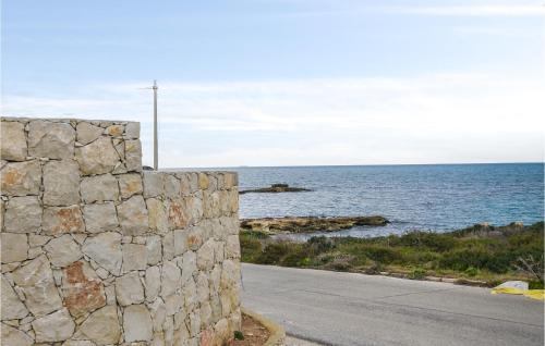Awesome Home In Pachino With Outdoor Swimming Pool, Wifi And 4 Bedrooms