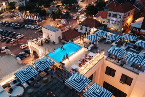an overhead view of a swimming pool on a building at Elements Hotel & Shops Curaçao in Willemstad