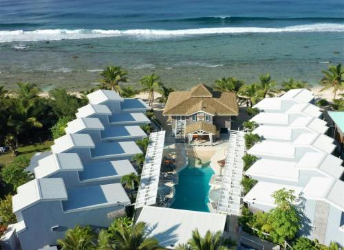 an aerial view of the hotel and the beach at Ocean Escape Resort & Spa in Rarotonga