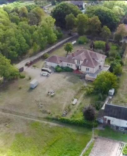 an aerial view of a house with a yard at Kopice " Kowalczyk In Nature Parks Blue Velo" in Gollnow