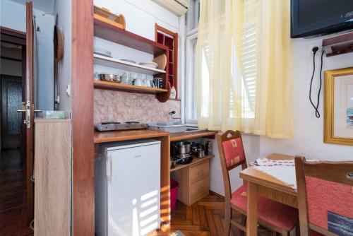 Kuchyň nebo kuchyňský kout v ubytování Apartments by the sea Opatija - Volosko, Opatija - 7912