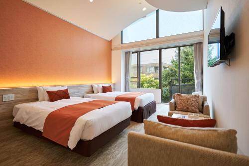 Cama o camas de una habitación en WeBase KAMAKURA