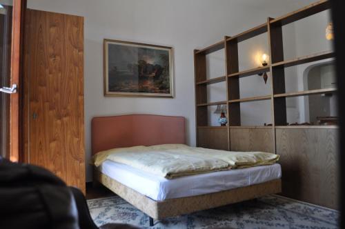 En eller flere senge i et værelse på Appartamenti Fortunella