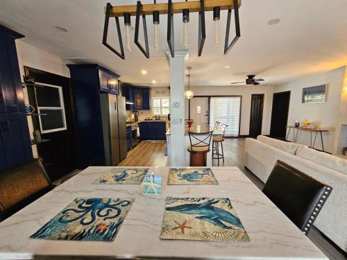 a dining room and living room with a table at Beautiful Clearwater home! in Clearwater