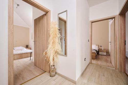 Postel nebo postele na pokoji v ubytování Apartman Aisha