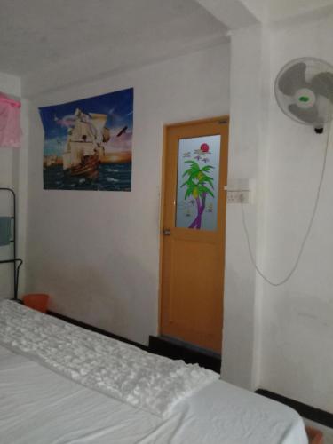Ένα ή περισσότερα κρεβάτια σε δωμάτιο στο Lucky Holiday Home