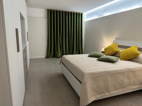Imbriani 69 Apartment tesisinde bir odada yatak veya yataklar
