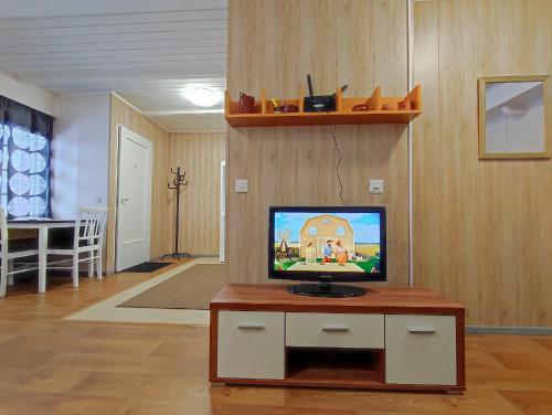 En tv och/eller ett underhållningssystem på ART Hotel JUNA