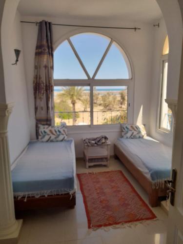 Säng eller sängar i ett rum på Dar Lagune Djerba