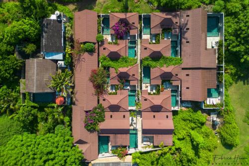 an aerial view of a house with plants at GiliZen Resort - Private Pool Villas in Gili Islands