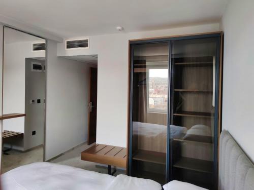 Katil atau katil-katil dalam bilik di Oaza Hotel