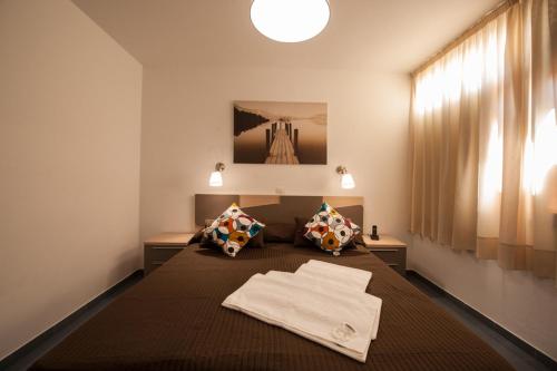 Cama o camas de una habitación en Apartamentos Miami Sun