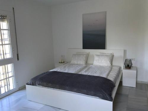 Ένα ή περισσότερα κρεβάτια σε δωμάτιο στο Villa dos Torres