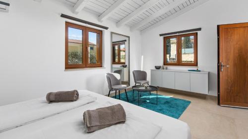 Ένα ή περισσότερα κρεβάτια σε δωμάτιο στο Villa Hardy by Villas Holiday