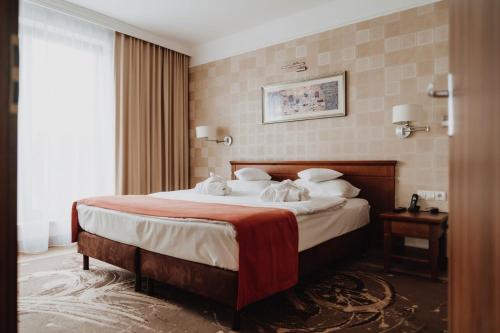 Postel nebo postele na pokoji v ubytování Hotel Esperanto
