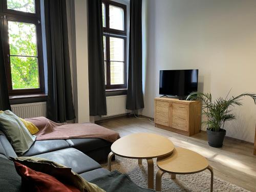 TV a/nebo společenská místnost v ubytování NEST Starówka Toruń
