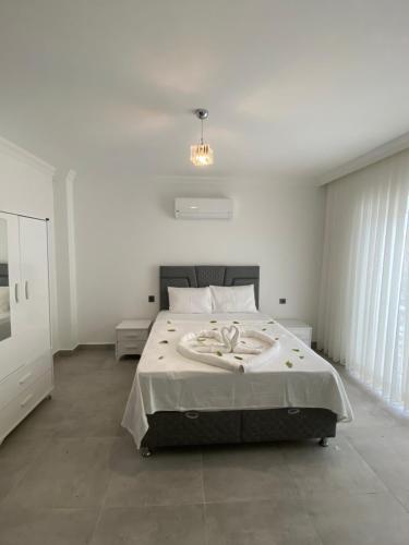 En eller flere senger på et rom på Tanış Villa’s