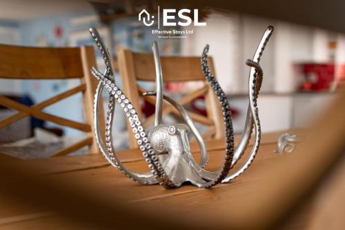 a group of antlers on top of a table at Beautiful En Suite 5 Bedroom Home with Sea Views in New Quay