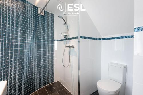 a bathroom with a shower and a toilet at Beautiful En Suite 5 Bedroom Home with Sea Views in New Quay