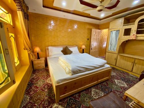 a bedroom with a bed in a room at North Palace Khaplu in Khaplu