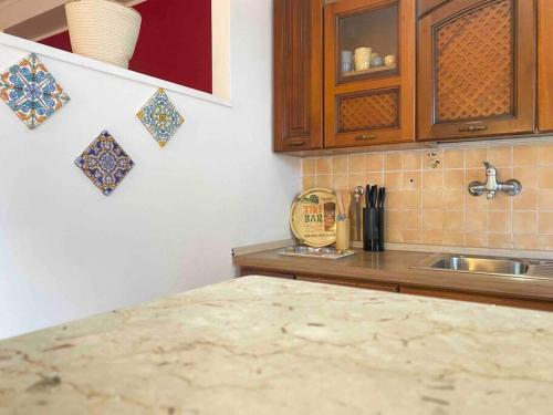 Kuchyň nebo kuchyňský kout v ubytování Mondello Apartment Mare beach