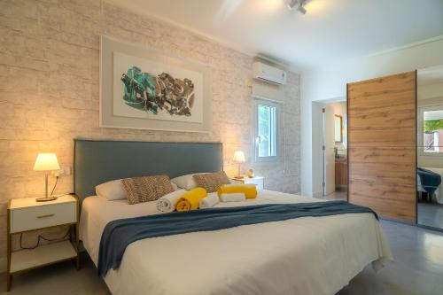 Postel nebo postele na pokoji v ubytování Villa SON FORTEZA by Mallorca Villa Selection