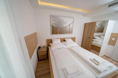 Ένα ή περισσότερα κρεβάτια σε δωμάτιο στο Master Resorts