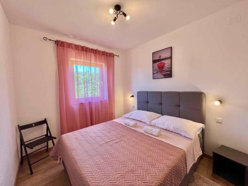 Posteľ alebo postele v izbe v ubytovaní Apartment in Jadranovo 43364