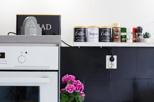 a counter with a shelf with products on it at Villa Mali Raj in Zaton