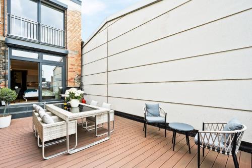 Foto Lit Living - Luxus Loft - Box Spring - Air Con - BBQ - Panorama 6