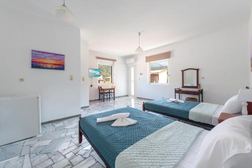 Postel nebo postele na pokoji v ubytování Almy Beach Hotel