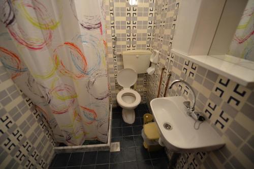 Ванная комната в Jimmy's Apartments