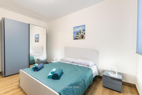 En eller flere senge i et værelse på House&Villas - Sea House