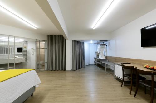 Η κουζίνα ή μικρή κουζίνα στο San Marino Suite Hotel