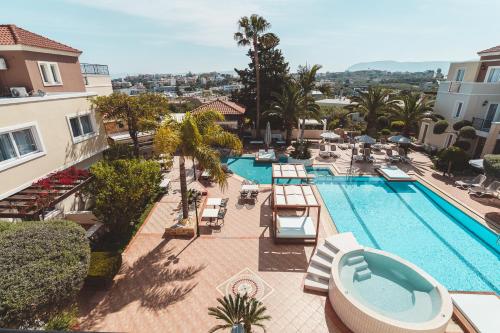 an overhead view of a swimming pool at a hotel at Zeus Village Resort - Adults Only in Kato Daratso