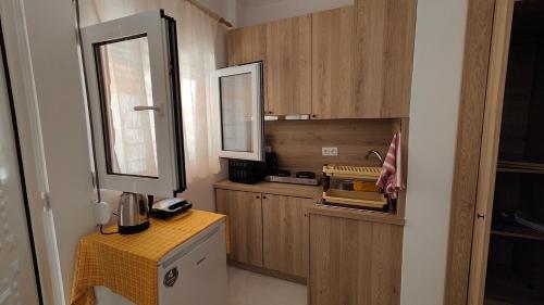 Kuchyň nebo kuchyňský kout v ubytování Central Excellence Apartment
