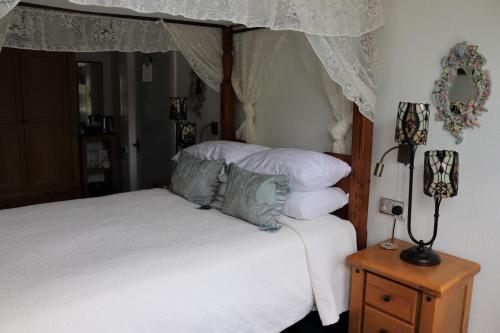 Katil atau katil-katil dalam bilik di Greylands Guest House