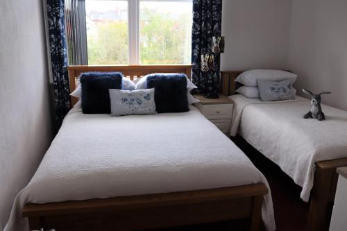 Katil atau katil-katil dalam bilik di Greylands Guest House